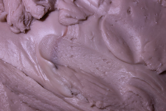 Close-up of purple cream or frosting with a smooth texture